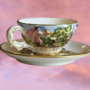 Vintage Capodimonte Cup and Saucer with gold gilding inside and out